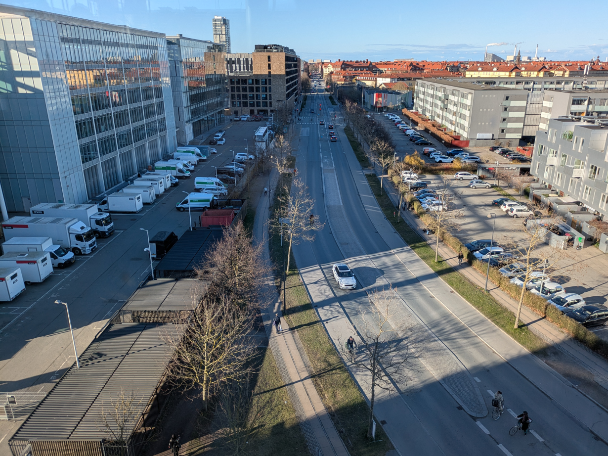 A typical arterial road in Denmark. Note: the amount of space taken by private motorised modes is greater than the amount of space dedicated for active travel. This suggests that there is room for improvement for active travel provision and quick wins even in cities with active travel levels that are high compared with most cities worldwide but which still have a high level of car ownership and use in absolute terms.