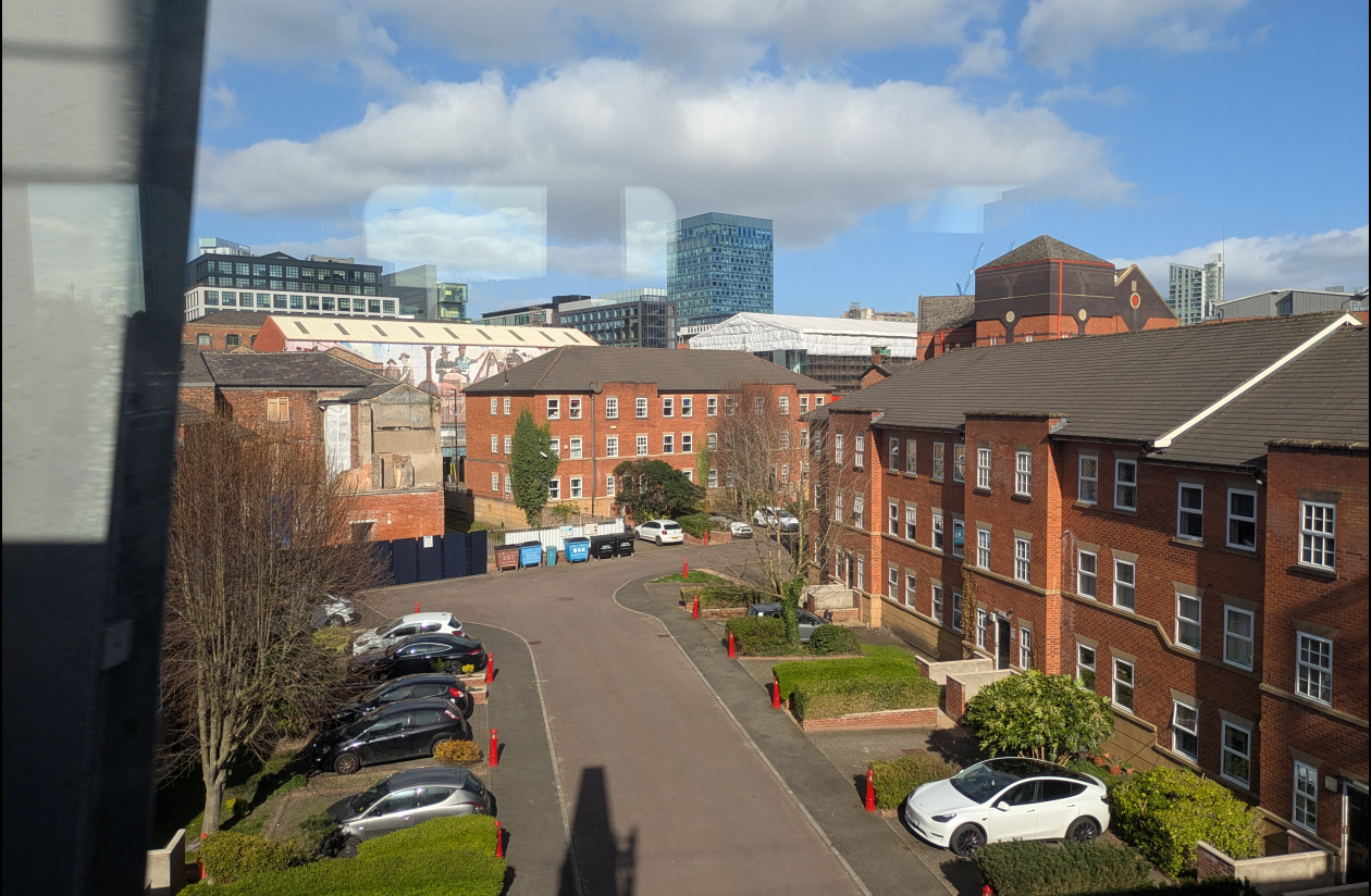 Photo of Manchester from the train to the airport on the way to Copenhage, highlighting the fact that there is great potential to ‘copenhagenize’ and make existing cities more liveable. Small interventions like providing clearly demarcated space for cycling and narrowing the carriageway that has low levels of traffic could help, as illustrated in the image below.